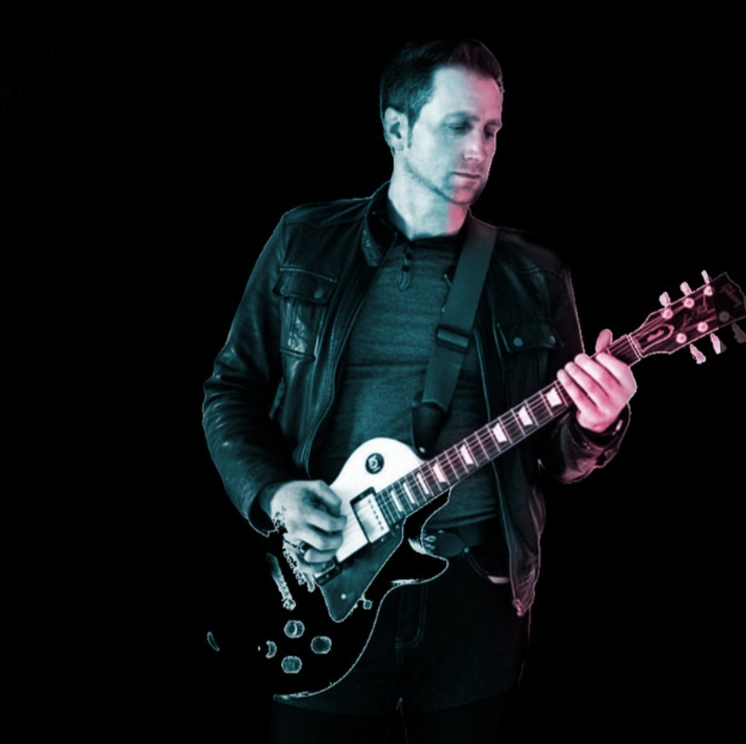 James Everett with a guitar